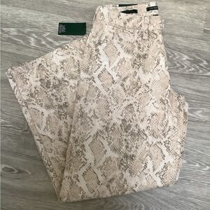 Low-Rise Baggy Jeans feature a trendy snakeskin pattern